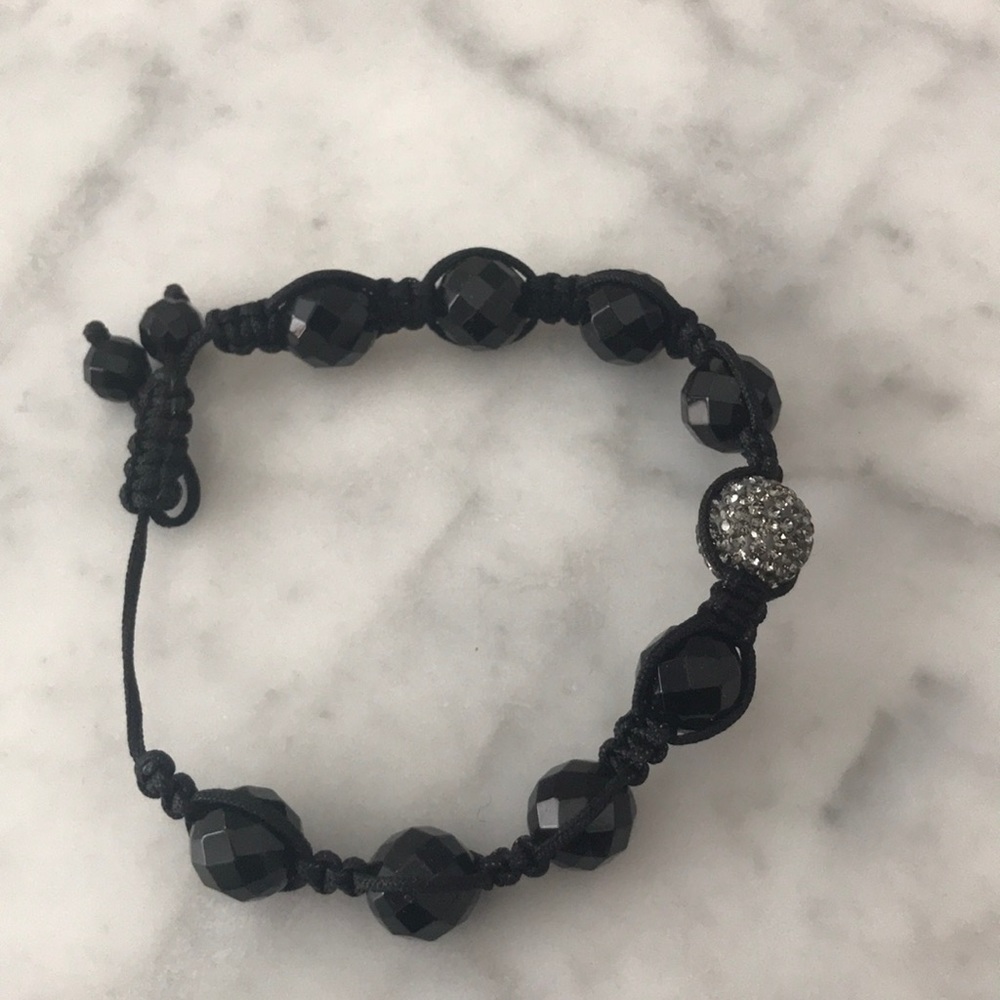 Black faceted bead bracelet with crystal bead